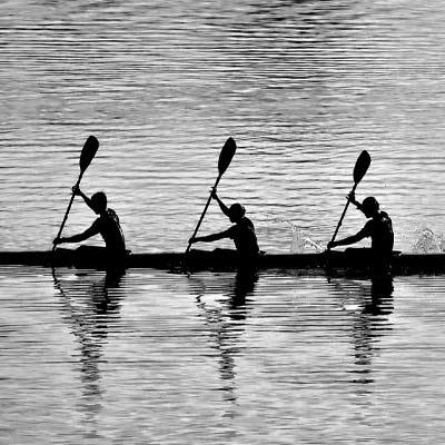 group of 4 rowing